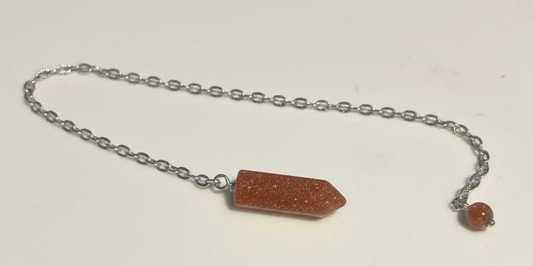 Goldstone- Ambitious Sparkle Pendulum By E-monae Jewels. 