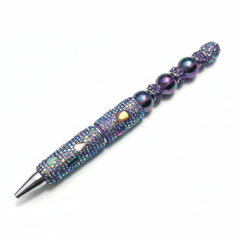 Handcrafted black rhinestone-encrusted pen with iridescent crystals and hematite beads by E-monae Jewels.