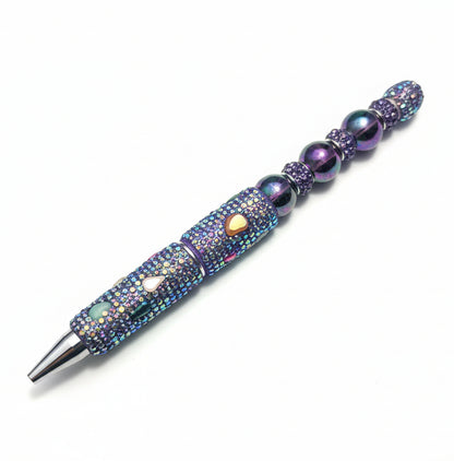 Handcrafted black rhinestone-encrusted pen with iridescent crystals and hematite beads by E-monae Jewels.
