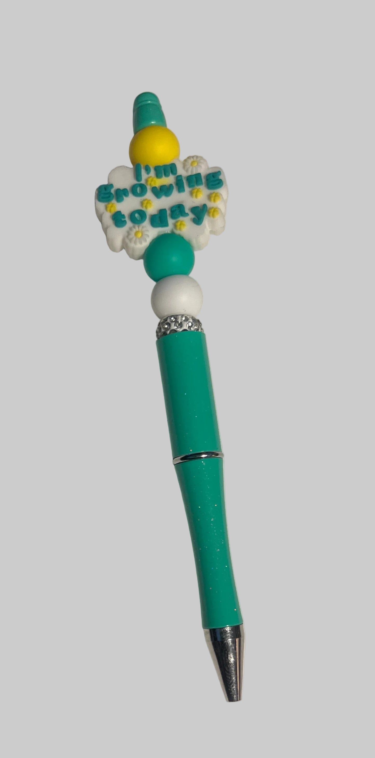 Handcrafted green beaded pen with "I'm Growing Today" flower charm by E-monae Jewels.