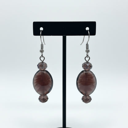 Pair of earrings with purple glass beads 
