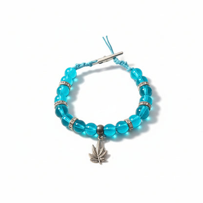 Blue beaded bracelet clip with a silver charm 