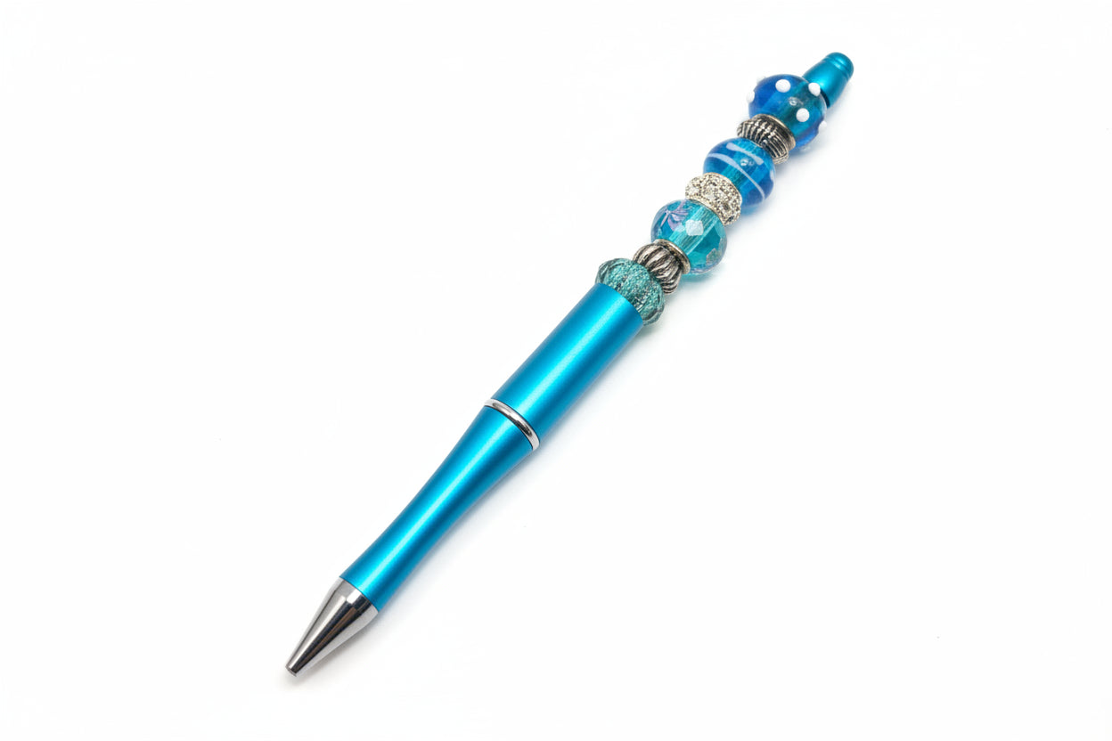 Handcrafted metallic blue beaded pen with teal and silver accents by E-monae Jewels.